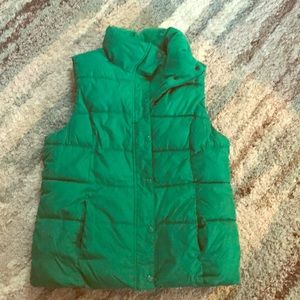 Green puffy vest.